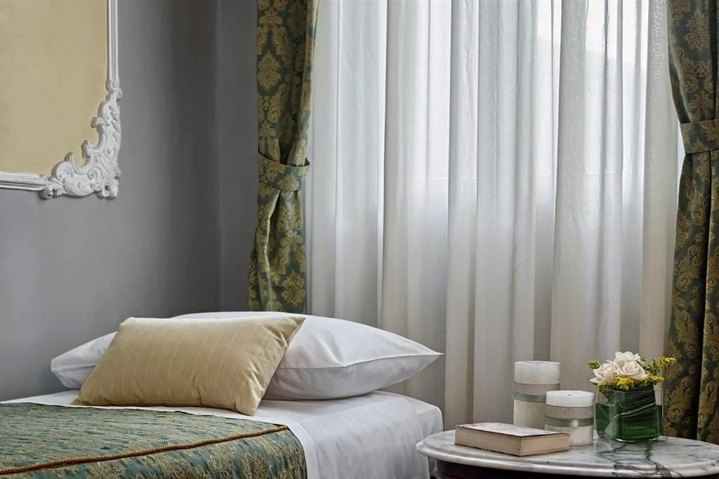 Family Room — Hotel Pausania