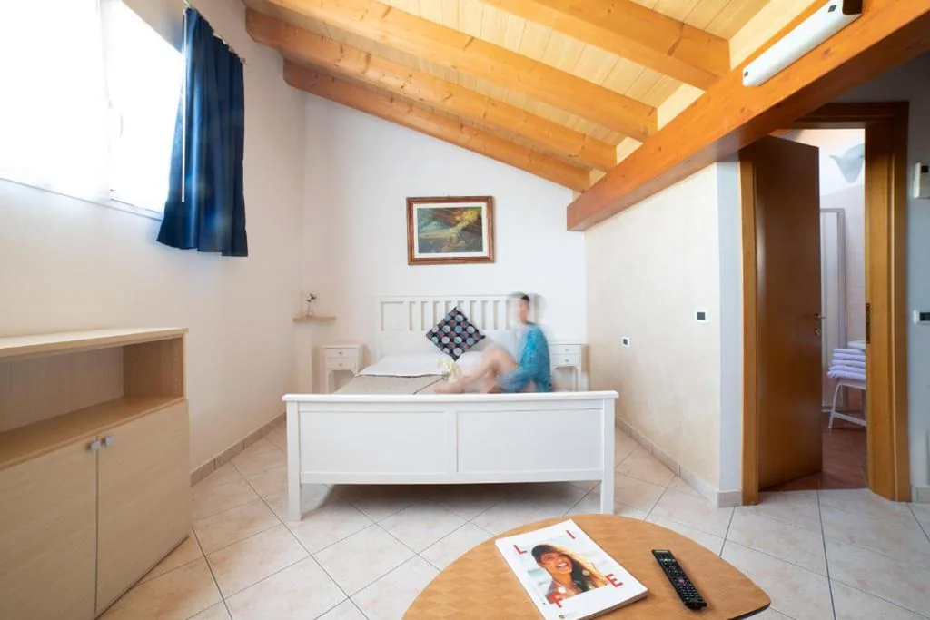 Camera Familiare Mansardata — Casa Merano Residence & Restaurant Bibione Centro