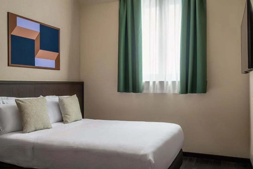 Budget Double Room — BYPILLOW Grand Central