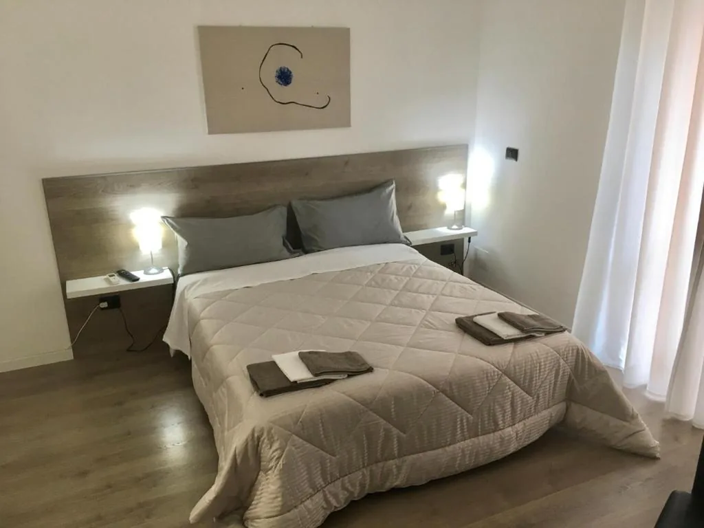Double Room with Private Bathroom — Fiore di Loto
