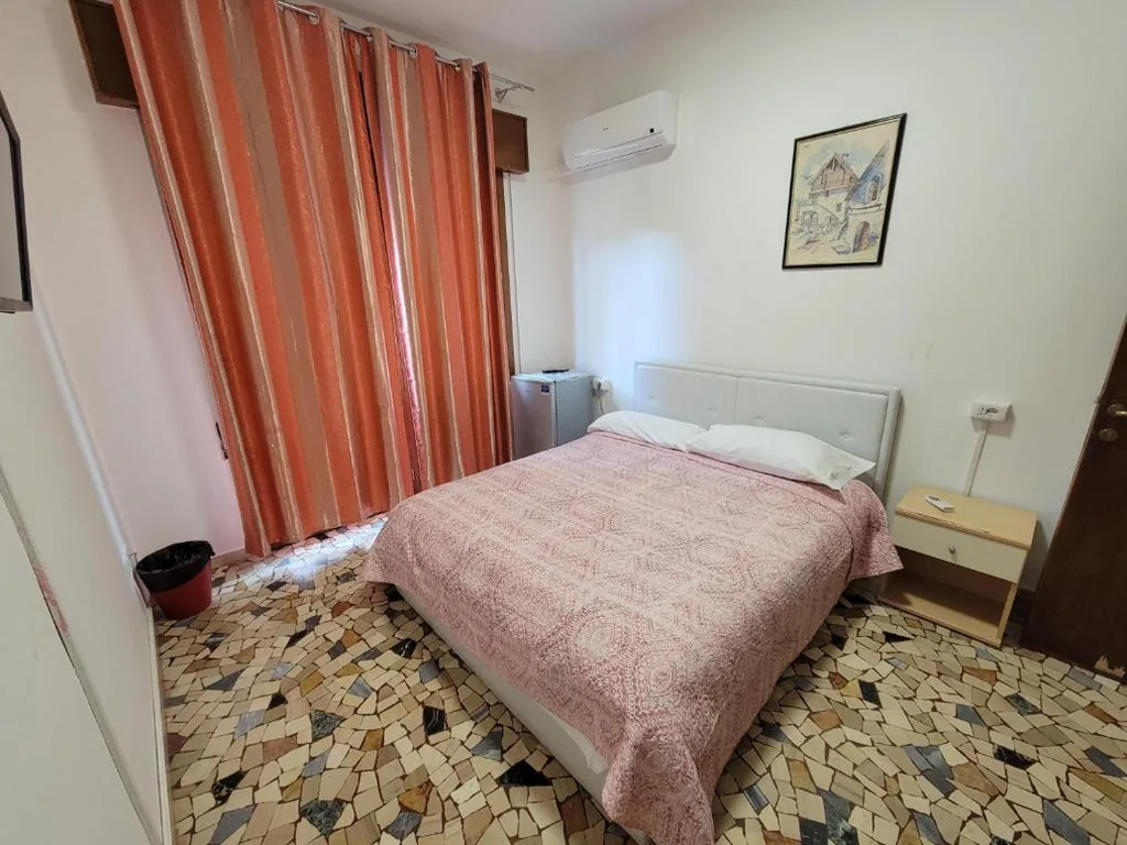 Double Room with Private Bathroom — The Caponi Bros