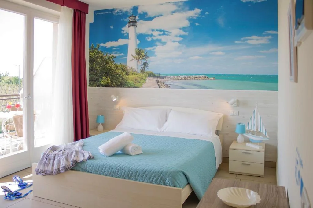 Double Room with Balcony and Partial Lake View — The Lighthouse Rooms