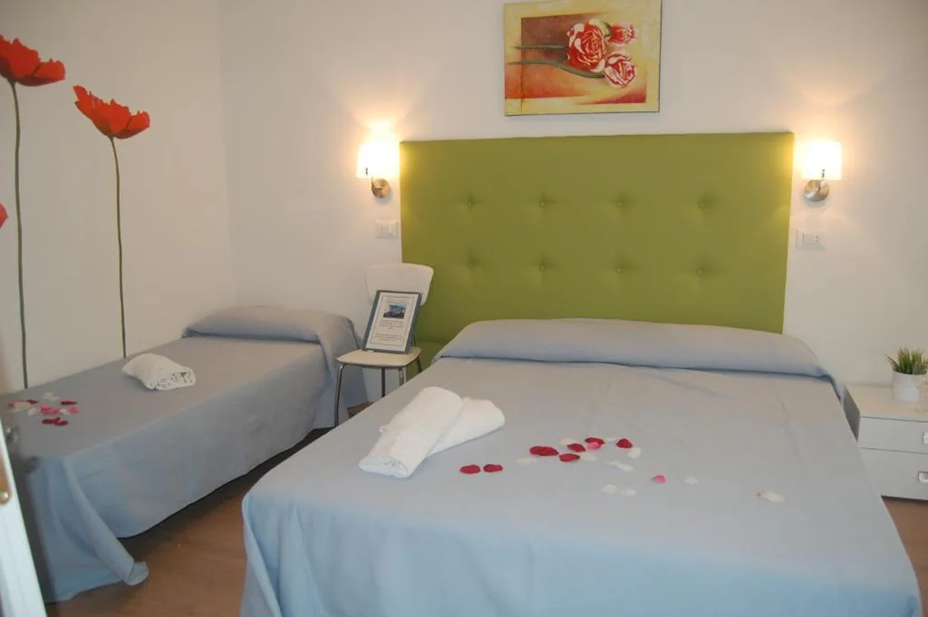 Camera Matrimoniale con Letto Supplementare — Hotel Irene