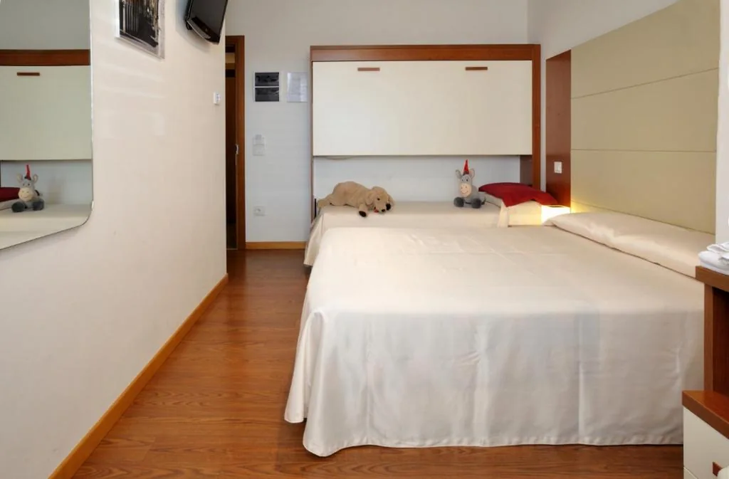 Double Room with Extra Bed — Hotel Mezzaluna