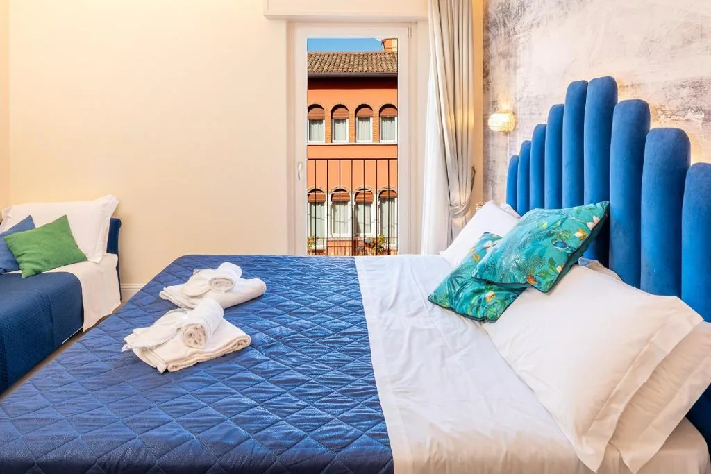Camera Matrimoniale con Letto Supplementare — I Tre Re Rooms