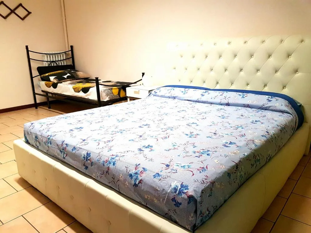 Camera Matrimoniale con Letto Supplementare — Nightstars B&B