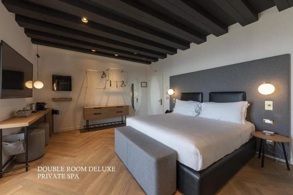 Deluxe Double Room with Private Spa, Terrace and Lake View — MaisonMe Boutique Hotel