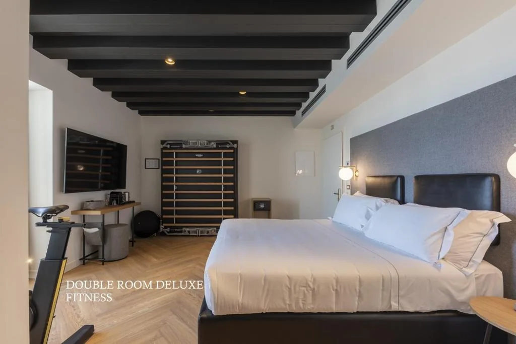 Deluxe Fitness Double Room with Terrace and Lake View — MaisonMe Boutique Hotel