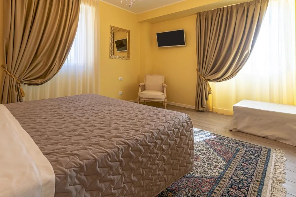 Camera Matrimoniale Deluxe — Villa Luisa Rooms and Breakfast