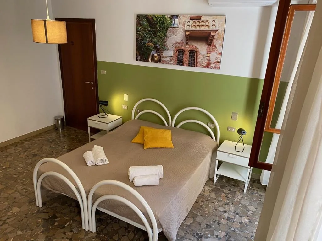 Double or Twin Room with Shared Bathroom — All’Arena