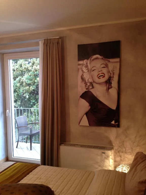 Double or Twin Room with Balcony and Garden View — Hotel Baia dei Pini