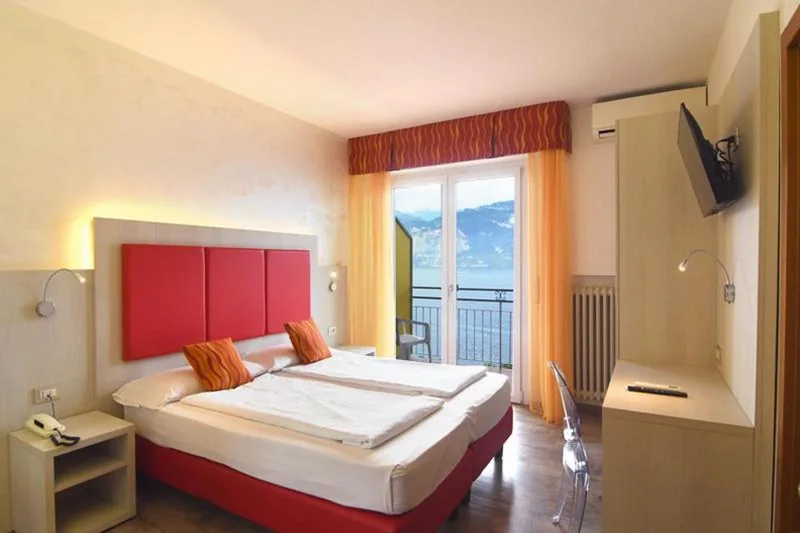 Double or Twin Room with Balcony and Lake View — Hotel Da Tino