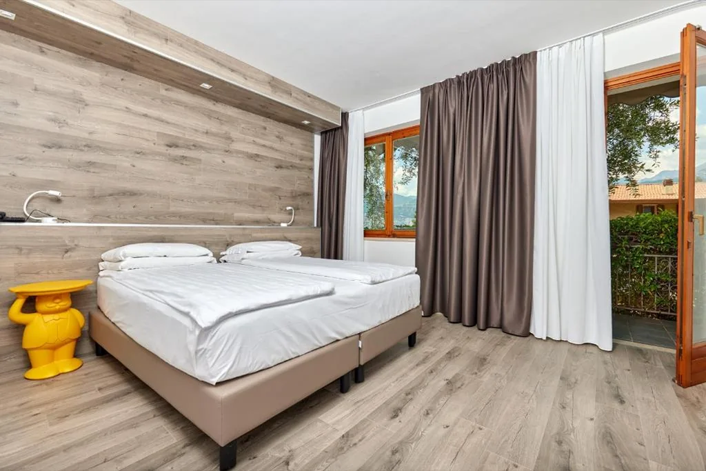 Double or Twin Room with Balcony - Ground Floor — Hotel Vacanze 2000 – Adults Only