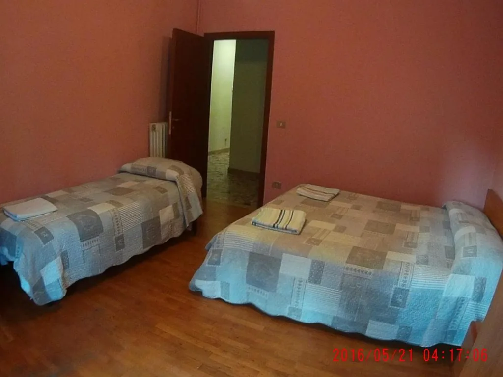 Double or Twin Room with Shared Bathroom — The Caponi Bros