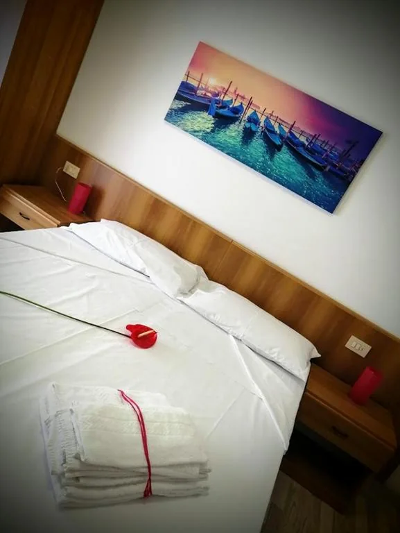 Camera Matrimoniale/Doppia con Letti Singoli con Letto Supplementare — Hotel Souvenir