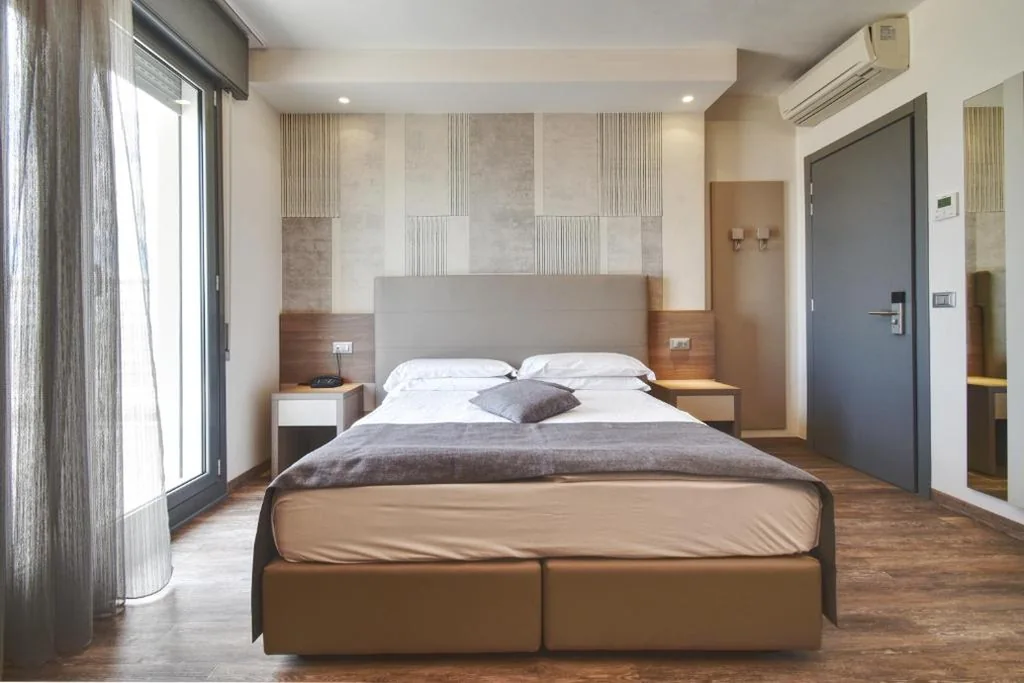 Double or Twin Room with Side Sea View — Hotel Delle Nazioni – Adults Only