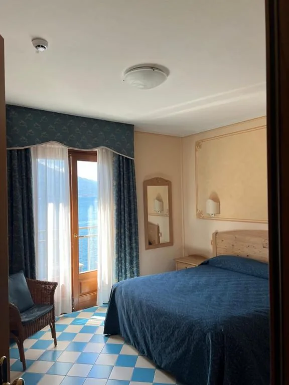 Double or Twin Room with Lake View — Hotel Locanda Ruscello Garnì