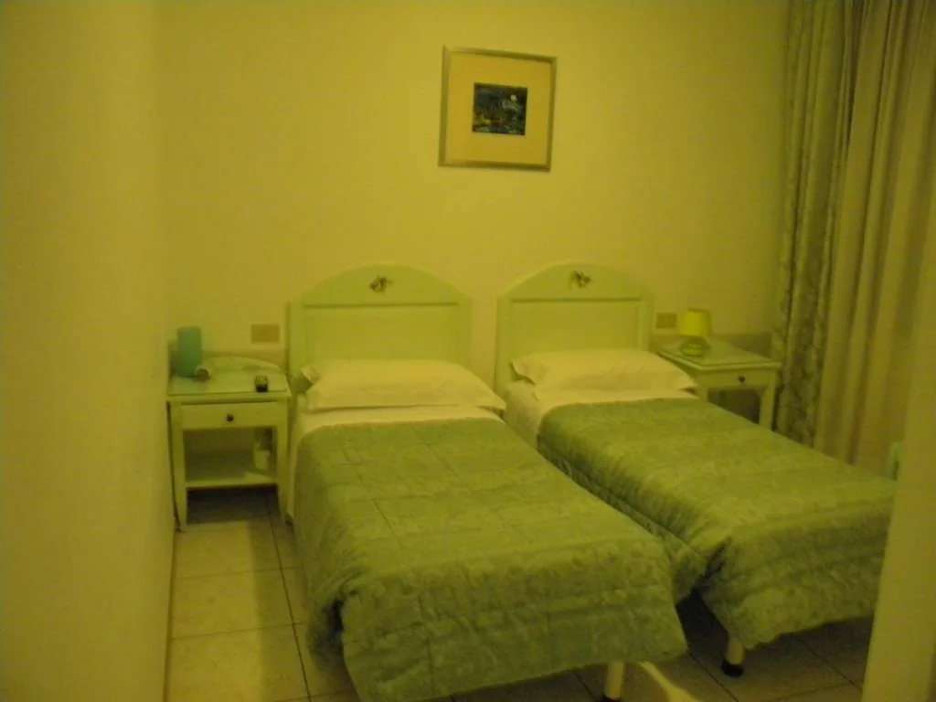 Double or Twin Room — Hotel Adua