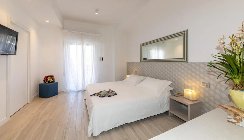Camera Matrimoniale/Doppia con Letti Singoli — Hotel Nettuno