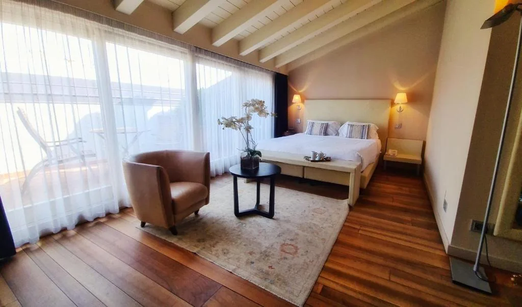 Two-Level Prestige Room with Lake View — Palazzo Ai Capitani
