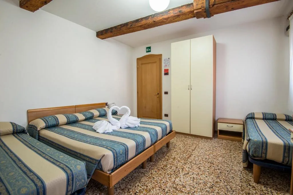Quadruple Room — Casa Sant’Andrea