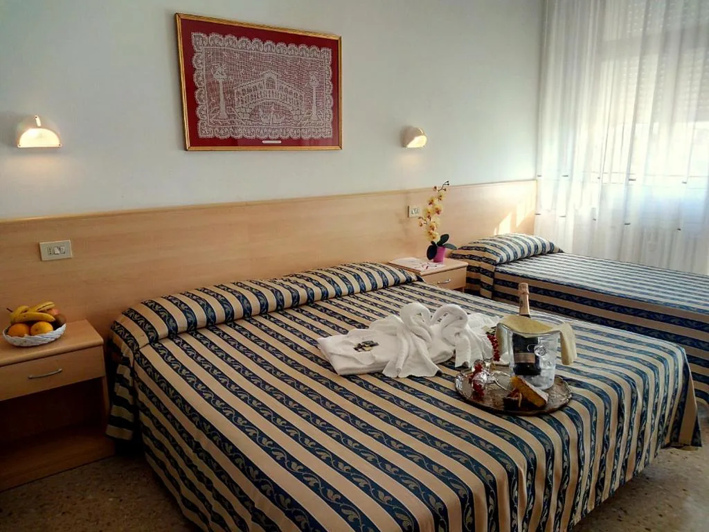 Classic Quadruple Room — Centro Vacanze Opera Nascimbeni