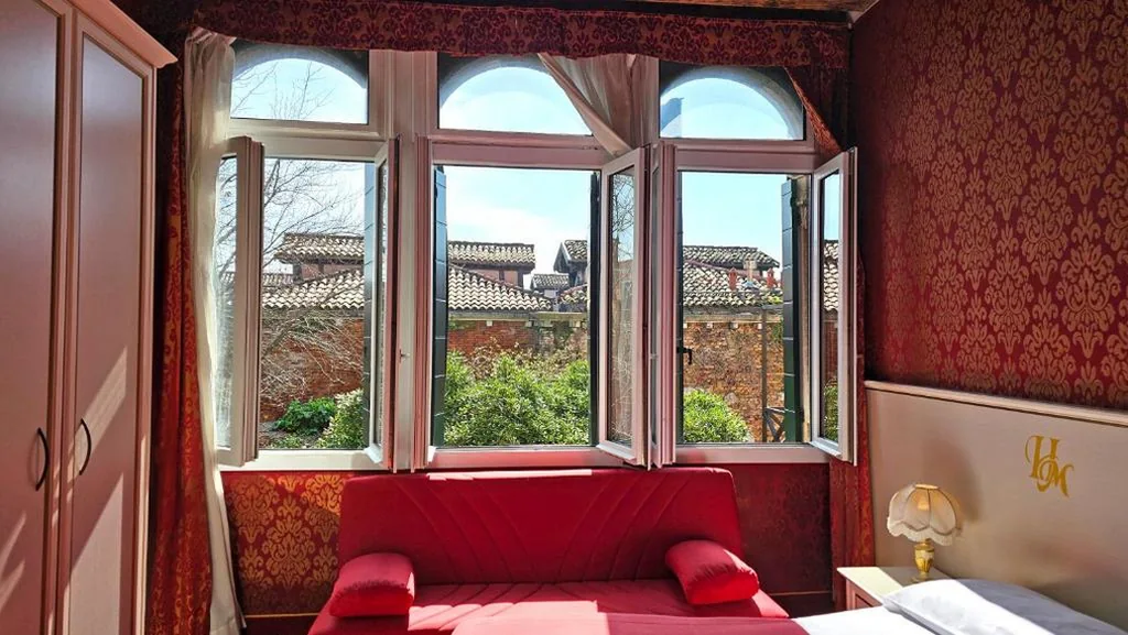 Classic Quadruple Room with External Private Bathroom — Hotel Messner