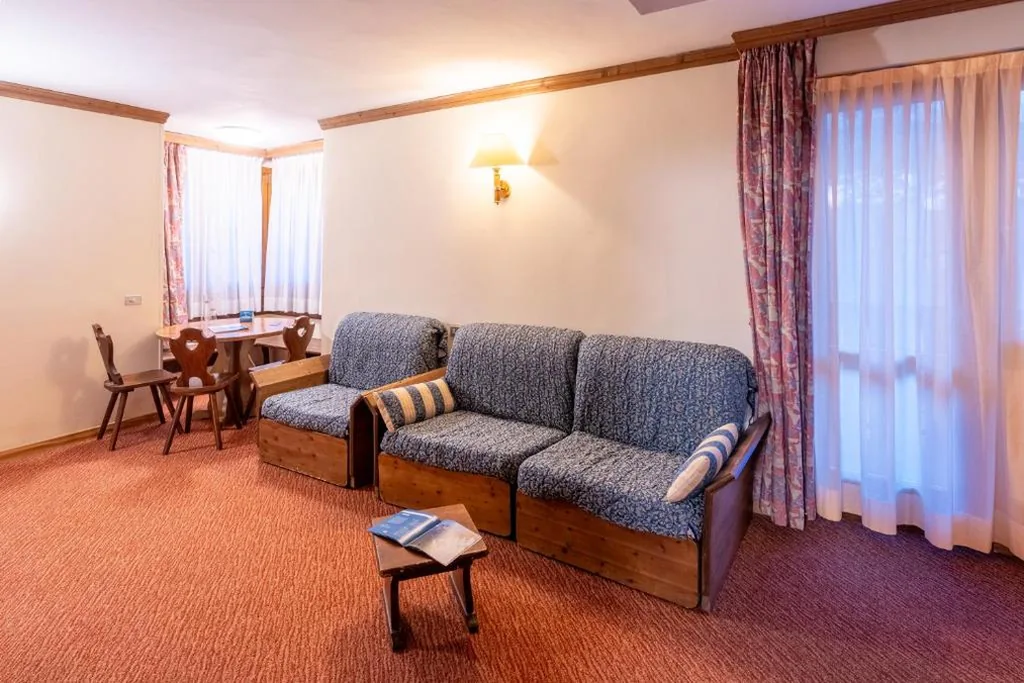 Classic Quadruple Room — Hotel Alaska Cortina