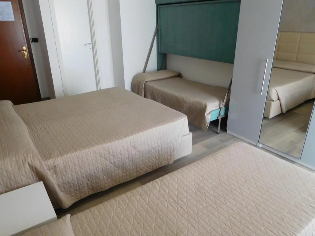 Classic Quadruple Room — Hotel Emperador