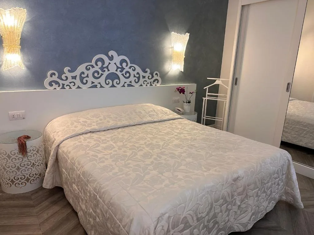 Comfort Quadruple Room — Hotel Albatros 3 Stelle Superior