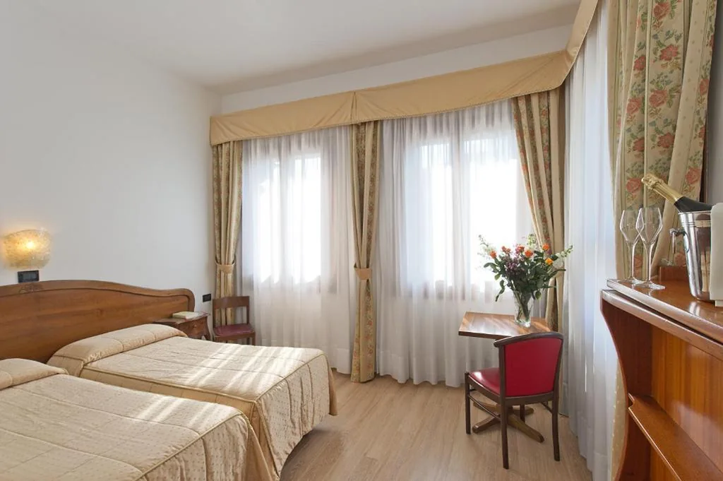 Comfort Quadruple Room — Hotel Cristallo