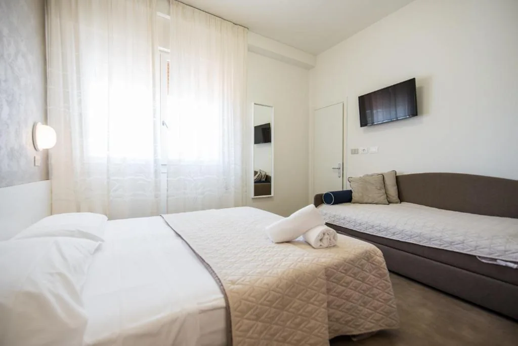 Camera Quadrupla Comfort — Hotel Cristina