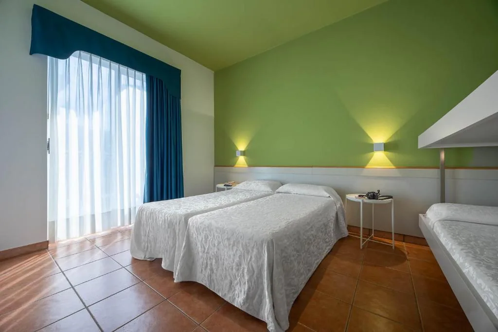 Comfort Quadruple Room — Hotel Portofino