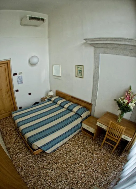 Quadruple Room with Shared Bathroom — Casa Sant’Andrea