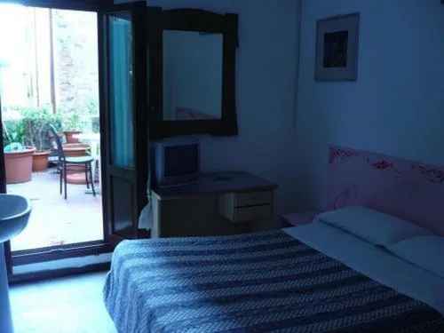 Quadruple Room with Shared Bathroom - Annex — Hotel Adua