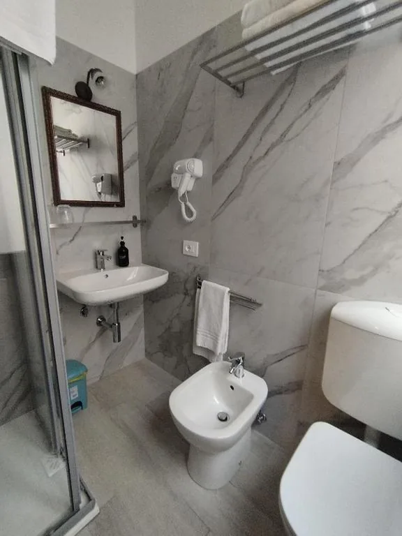 Quadruple Room with Private Bathroom — Alloggi SS Giovanni e Paolo