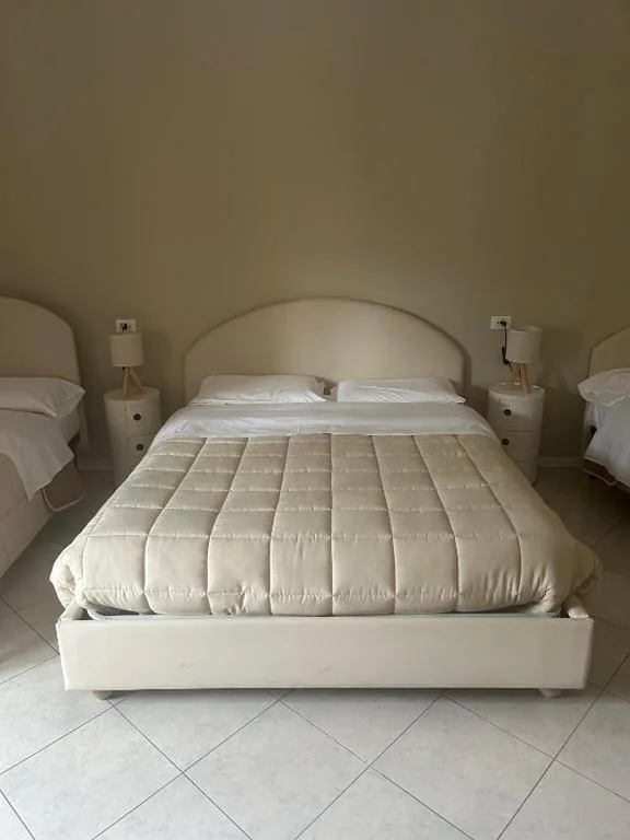 Camera Quadrupla con Bagno Privato Esterno — La Magnolia – Rooms