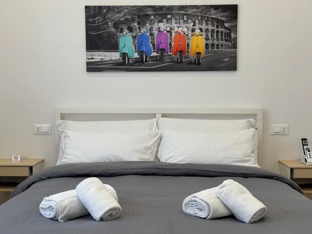 Quadruple Room with Private Bathroom — OTB ITALIA – Airport Rooms