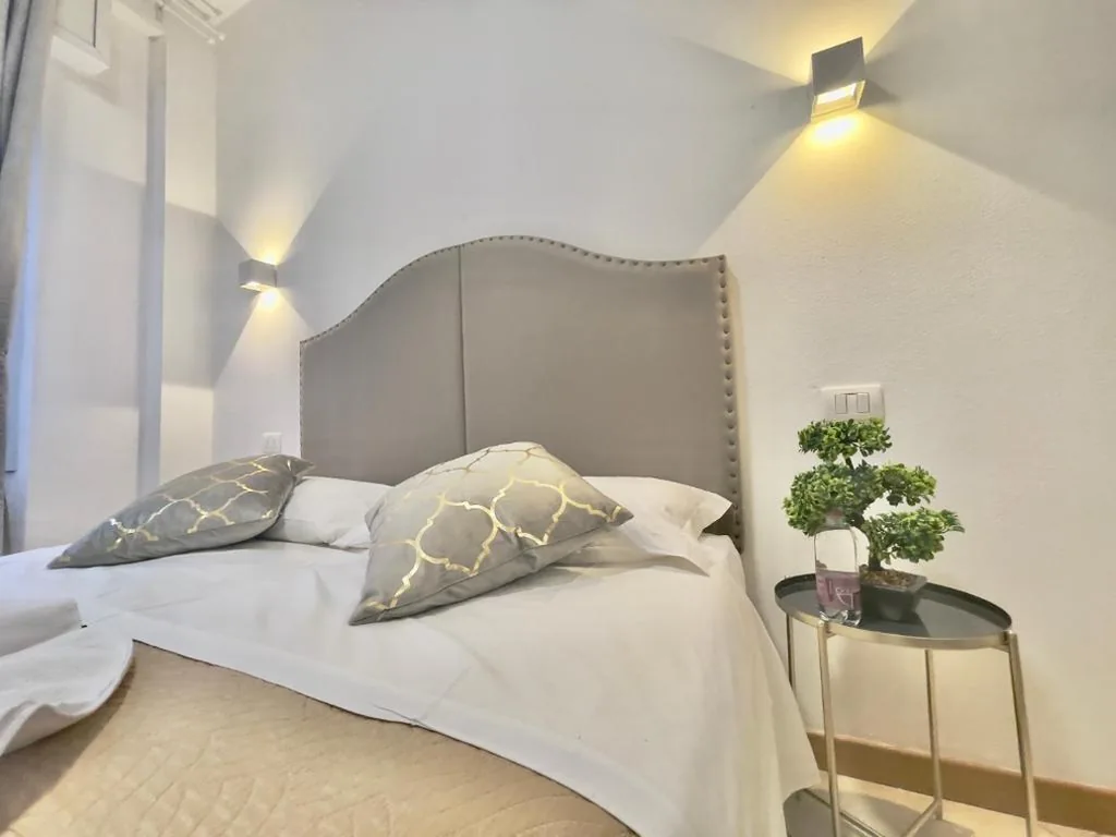 Quadruple Room with Bathroom — Vitti’s Home Verona 3