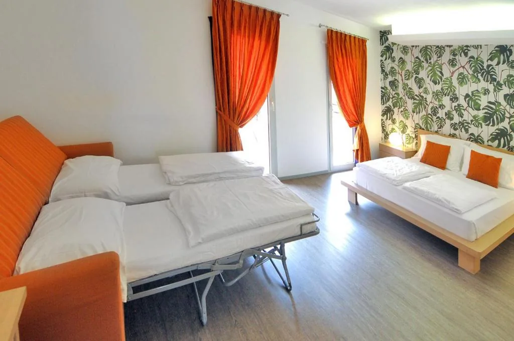 Quadruple Room with Balcony — Eco Hotel Cleofe