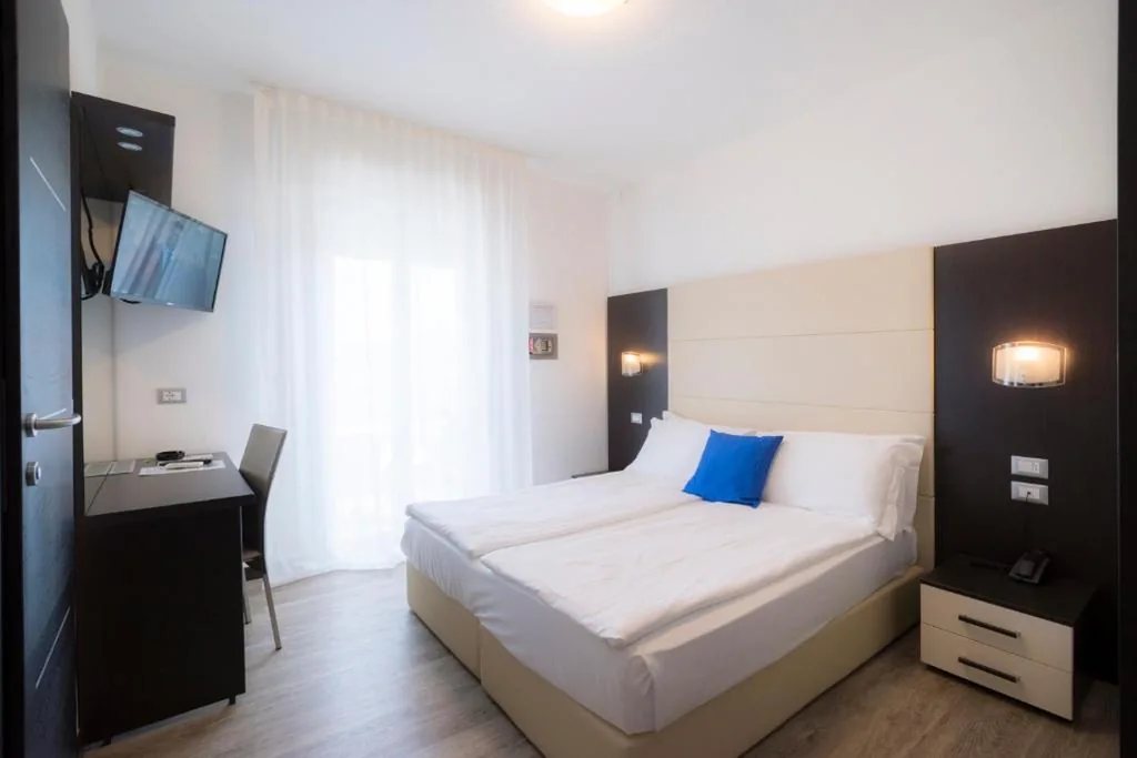 Quadruple Room with Balcony — Hotel Bristol