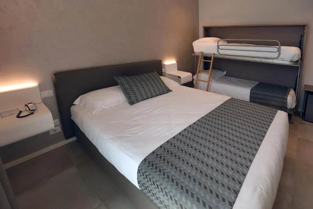 Quadruple Room with Balcony — Hotel Buena Onda