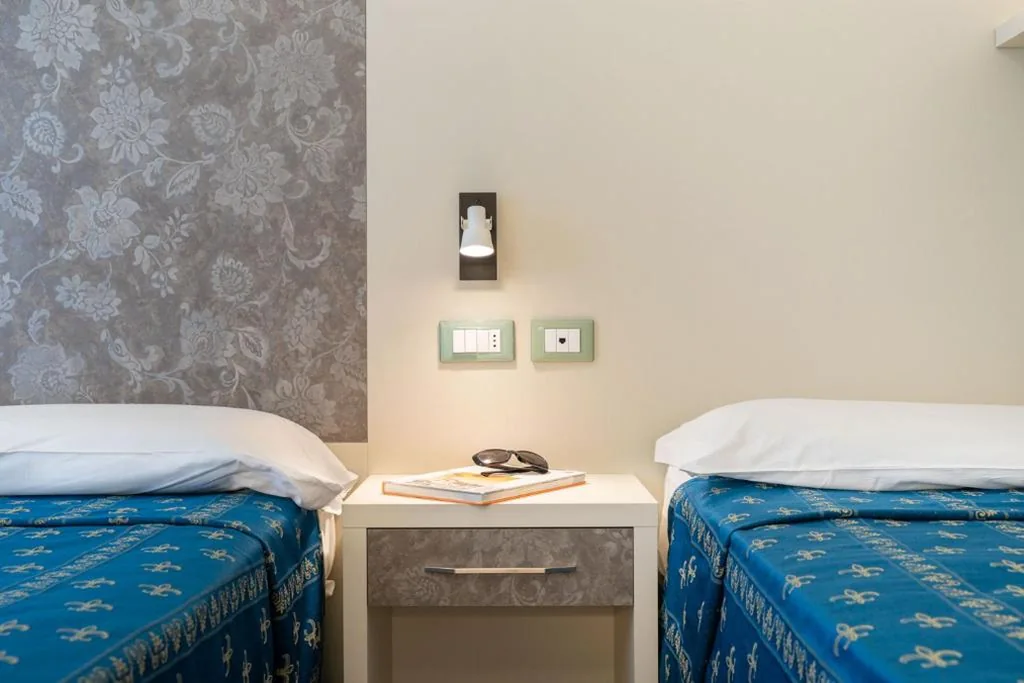 Quadruple Room with Balcony — Hotel Ca’ D’Oro
