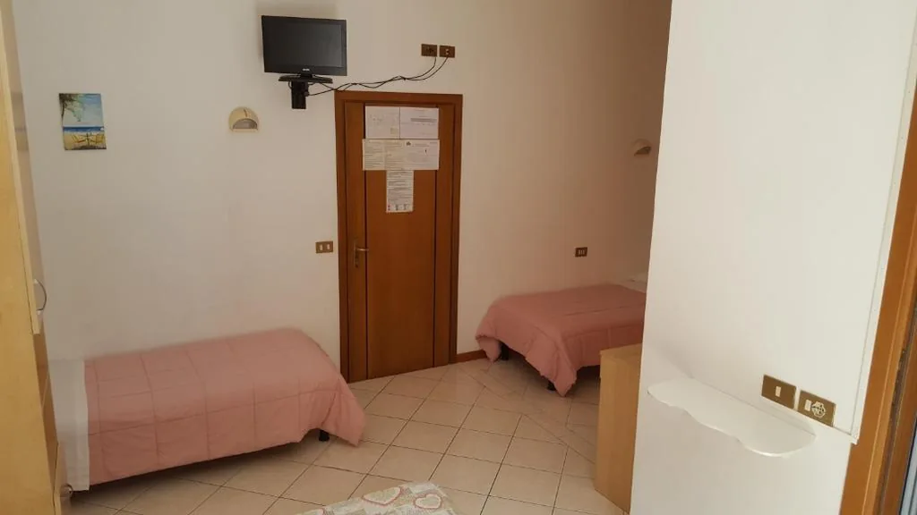 Quadruple Room with Balcony — Hotel Canova