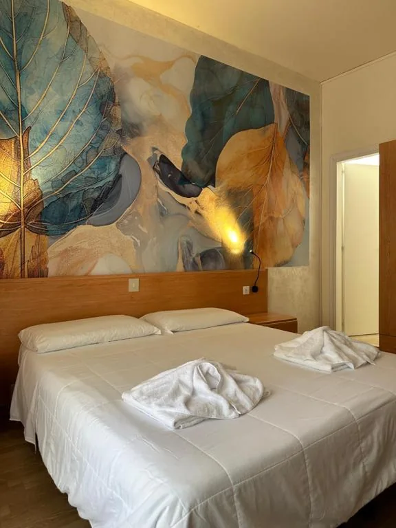 Quadruple Room with Balcony — Hotel LA MAISON by Aldebaran