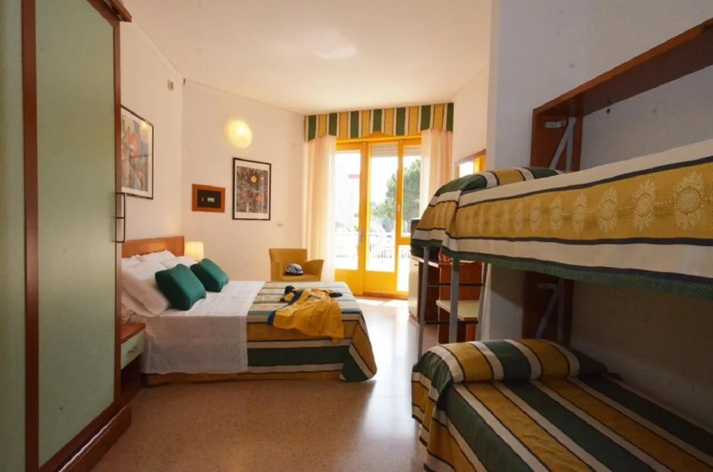 Quadruple Room with Balcony — Hotel Luna