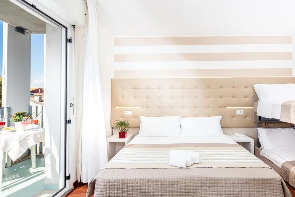 Camera Quadrupla con Balcone — Hotel Palace