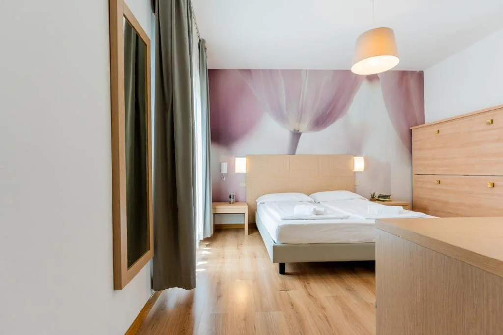 Camera Quadrupla con Balcone — Hotel Regina