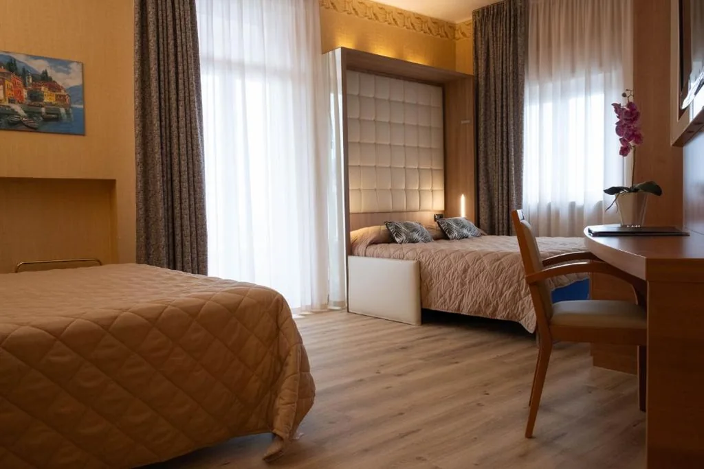 Quadruple Room with Balcony — Hotel Vela D’oro ***S