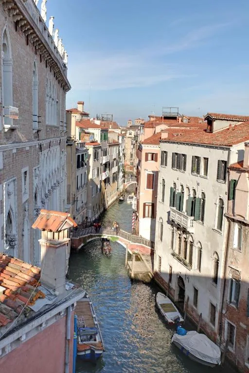 Quadruple Room with Terrace and Canal View — Locanda Delle Acque